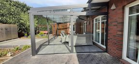 Terrassenüberdachung mit Glasschiebetür
