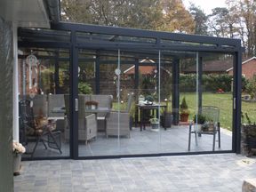 Terrassenüberdachung mit Glasschiebetür